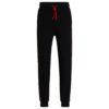 Pantalone Hugo Boss in cotone con banda logo