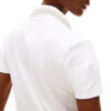 Polo Tommy Hilfiger slim fit con bottoni dorati